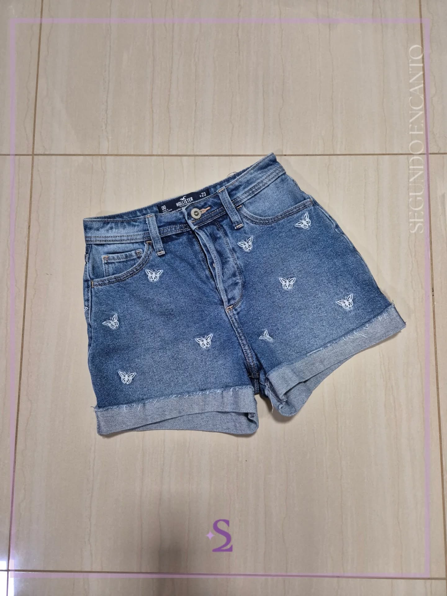 Short denim con mariposas bordadas w23 como XS - Image 1