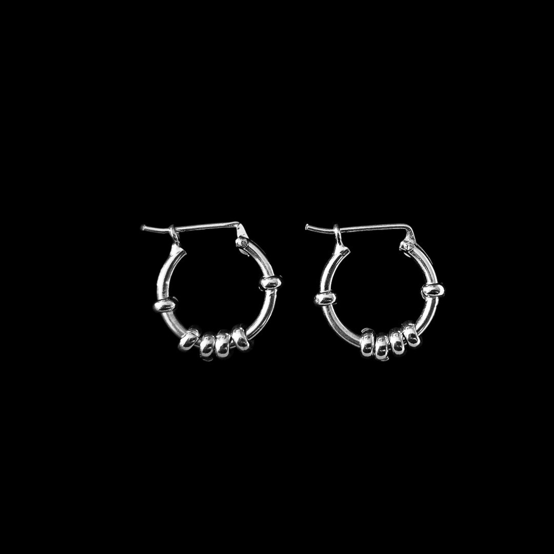 ARGOLLAS CON DONAS CORREDIZAS - Image 1